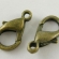 Užsegimas vėriniui žalvarinis 12x6mm