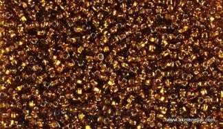 PRECIOSA rocailles.Originali 50 g pakuotė. 10/0 dydis. Rudas gintaro tamsus skaidrus su folija