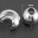 Spastukų paslėpėjai- kriauklės,  metalo spalvos 5mm. Pakuotė 20vnt.